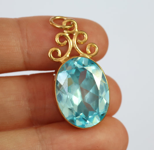 Enchanted 18ct Gold & Sterling Silver Blue Zircon Pendant